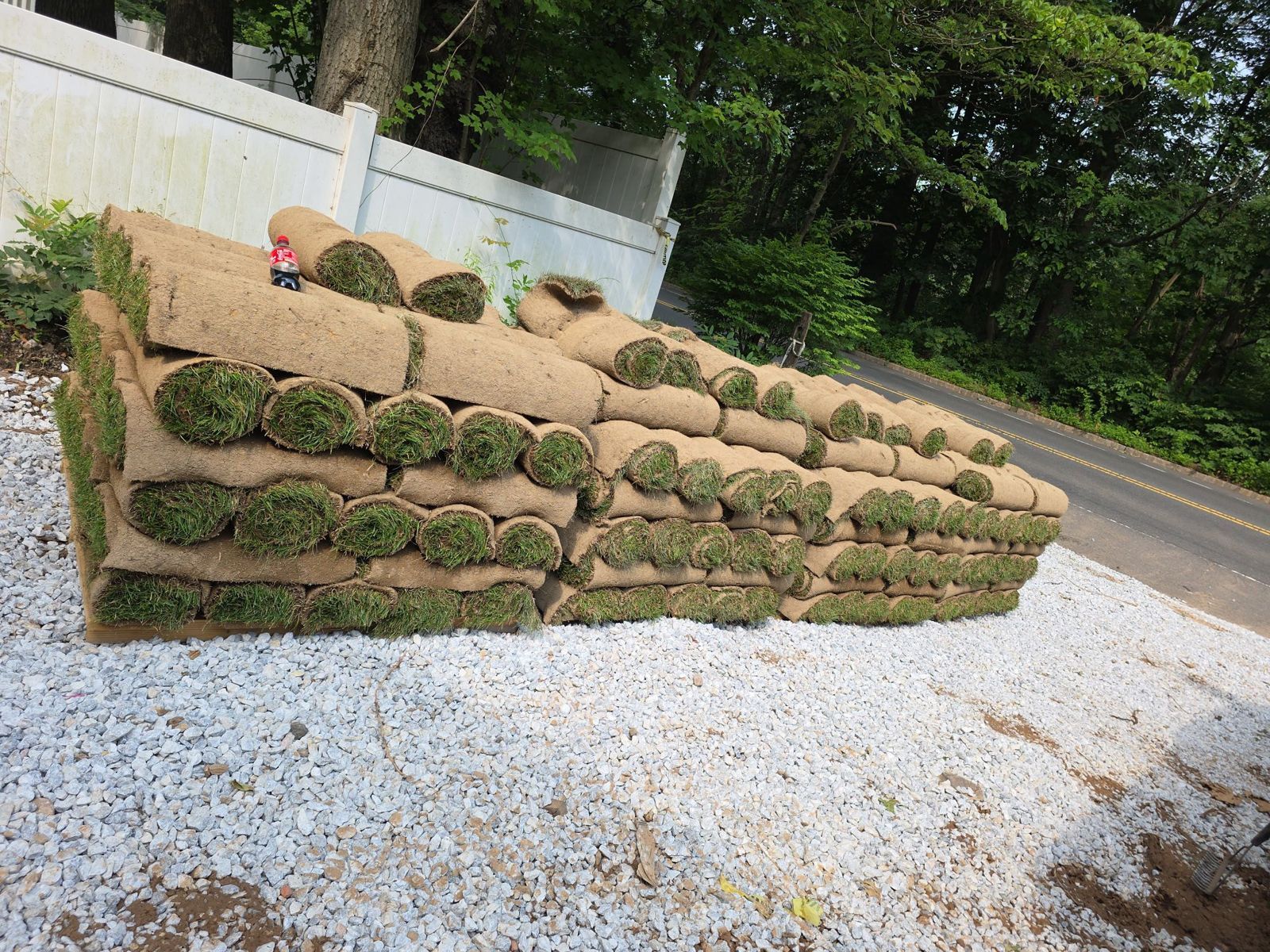 Pallets of fresh-cut sod staged for delivery