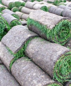 Fresh sod delivery pallets staged for a Bergen County New Jersey lawn project