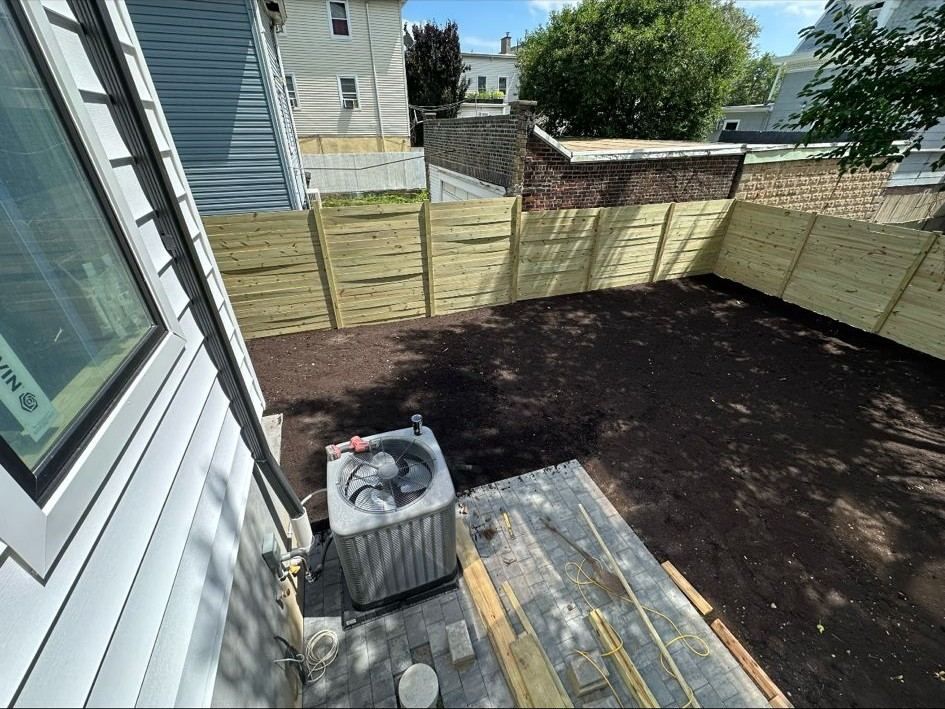 Mercer County NJ sod installation site prepared for fresh sod, showing soil prep and yard readiness before turf is laid