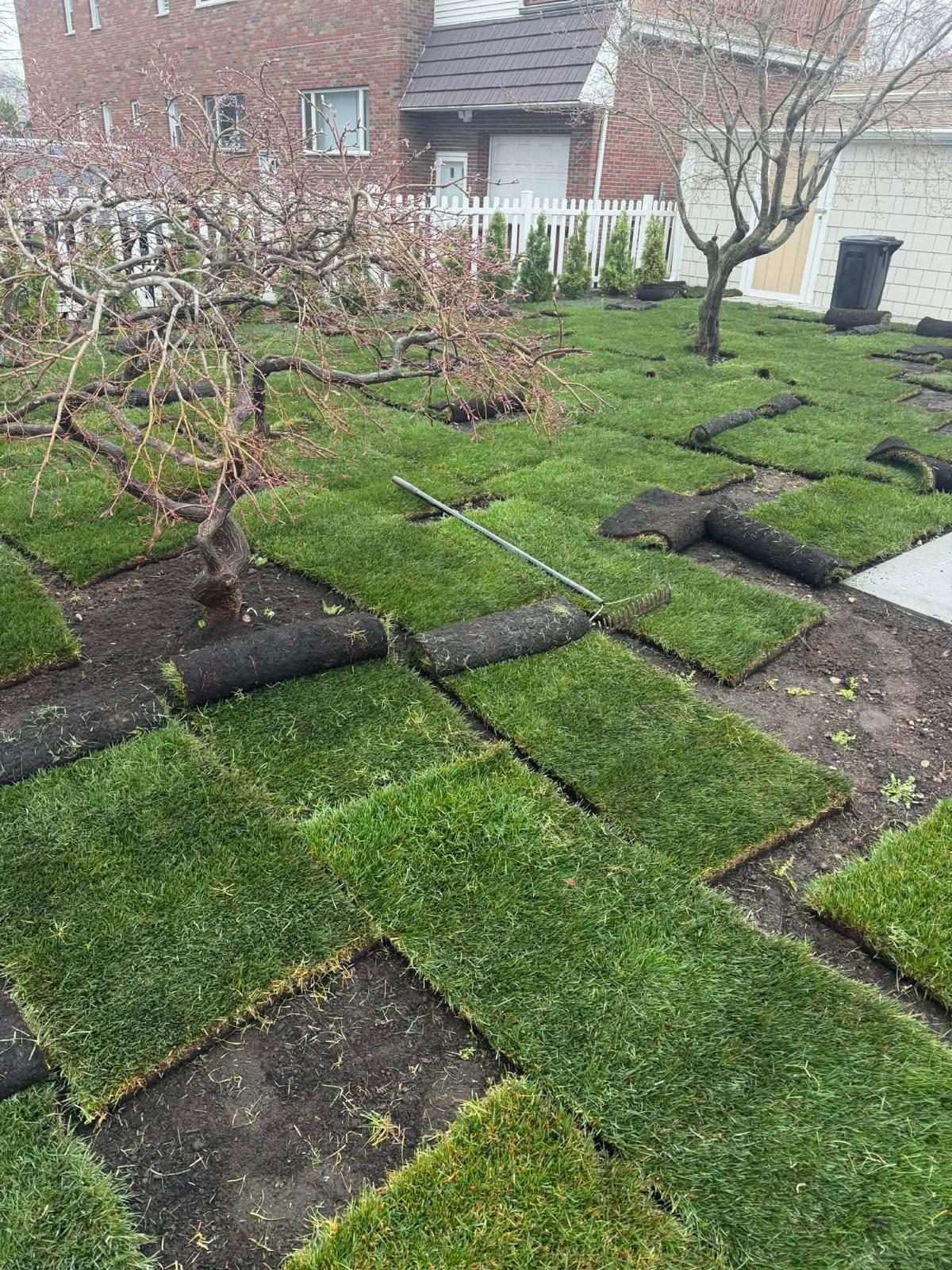 Sod installation in progress for a Bergen County New Jersey project